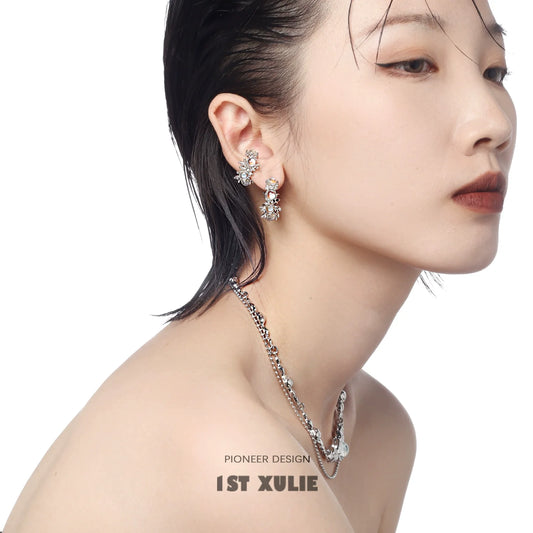 Stylish moonstone hoop earrings showcased on a model with sleek hair and elegant jewelry