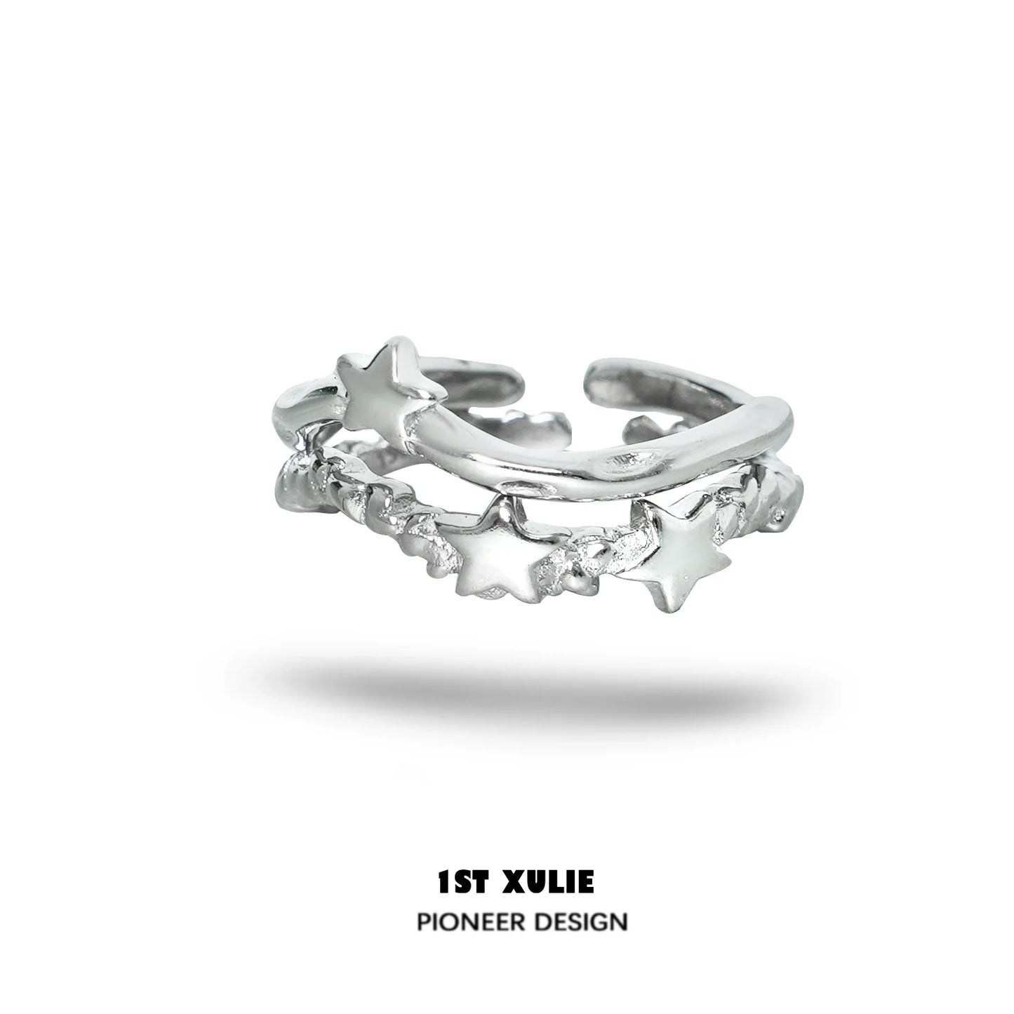 Silver star couple ring featuring a unique intertwined design with star accents