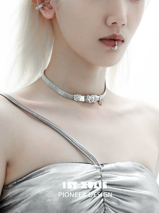 Stylish model wearing a Y2K belt buckle choker paired with a silver dress for a trendy look