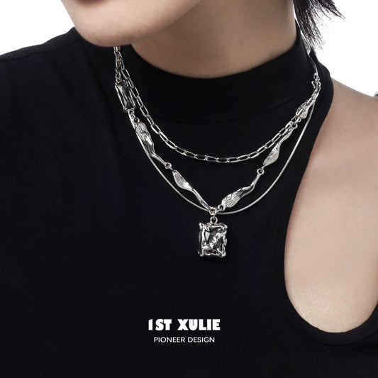 Y2K frost gem necklace layered with elegant silver chains for a trendy look