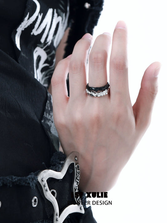 Y2K silver couple ring displayed on hand with black outfit, showcasing its modern design and style