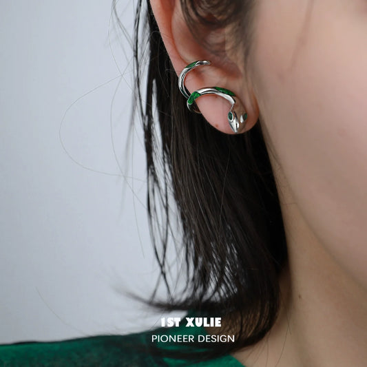 Y2K Slytherin snake earrings in green and silver, perfect for stylish fans of the wizarding world