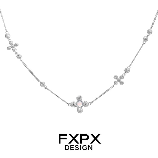 Pure Radiance Cross Necklace