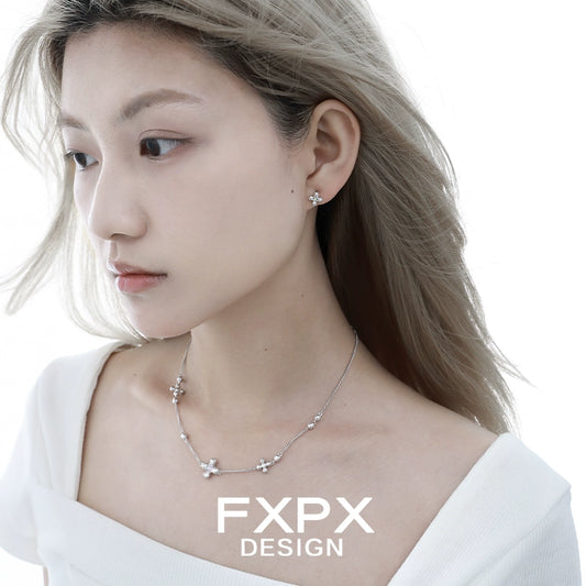 Pure Radiance Cross Necklace