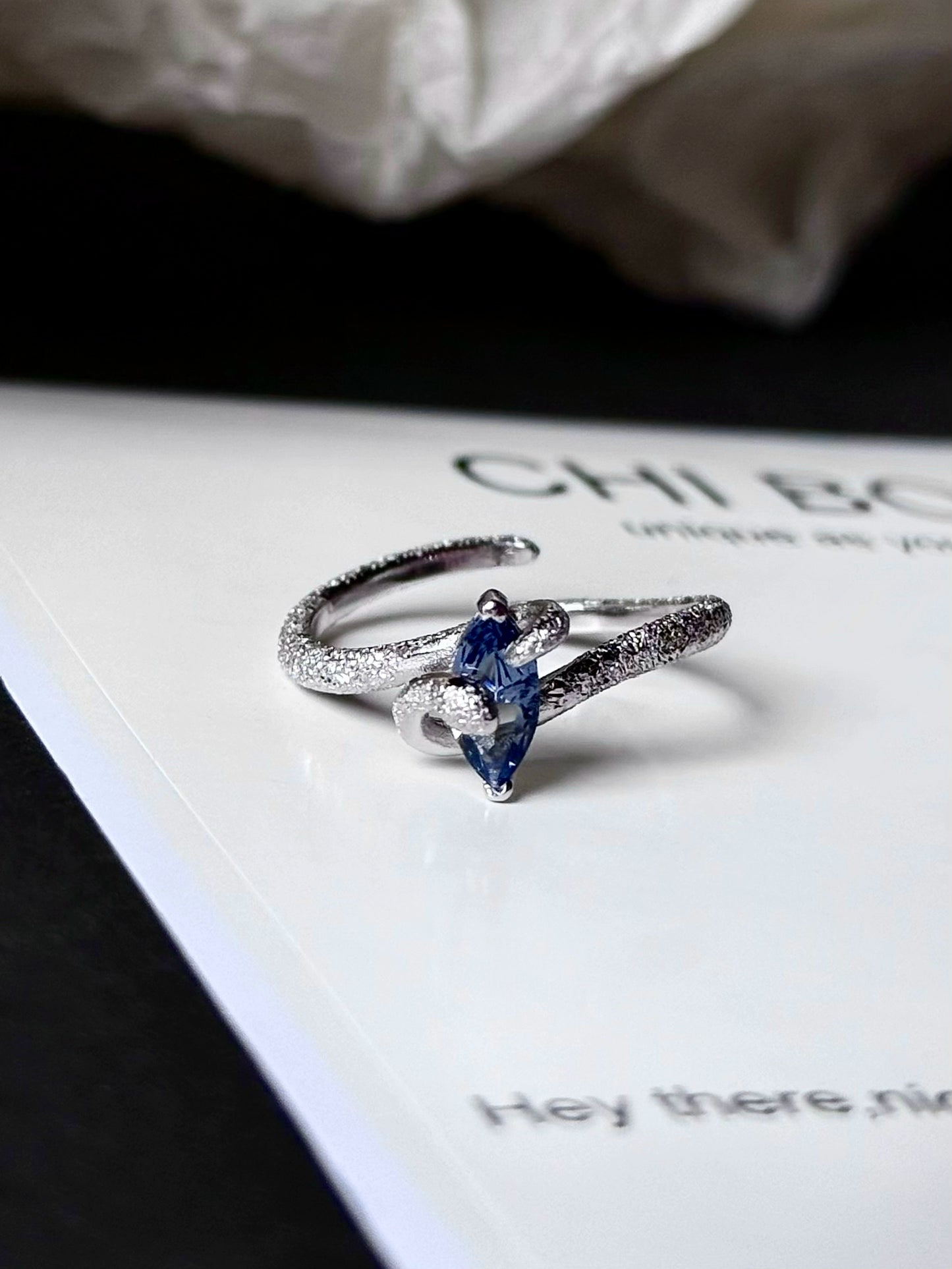 "Snow Snake" Blue Zircon Ring