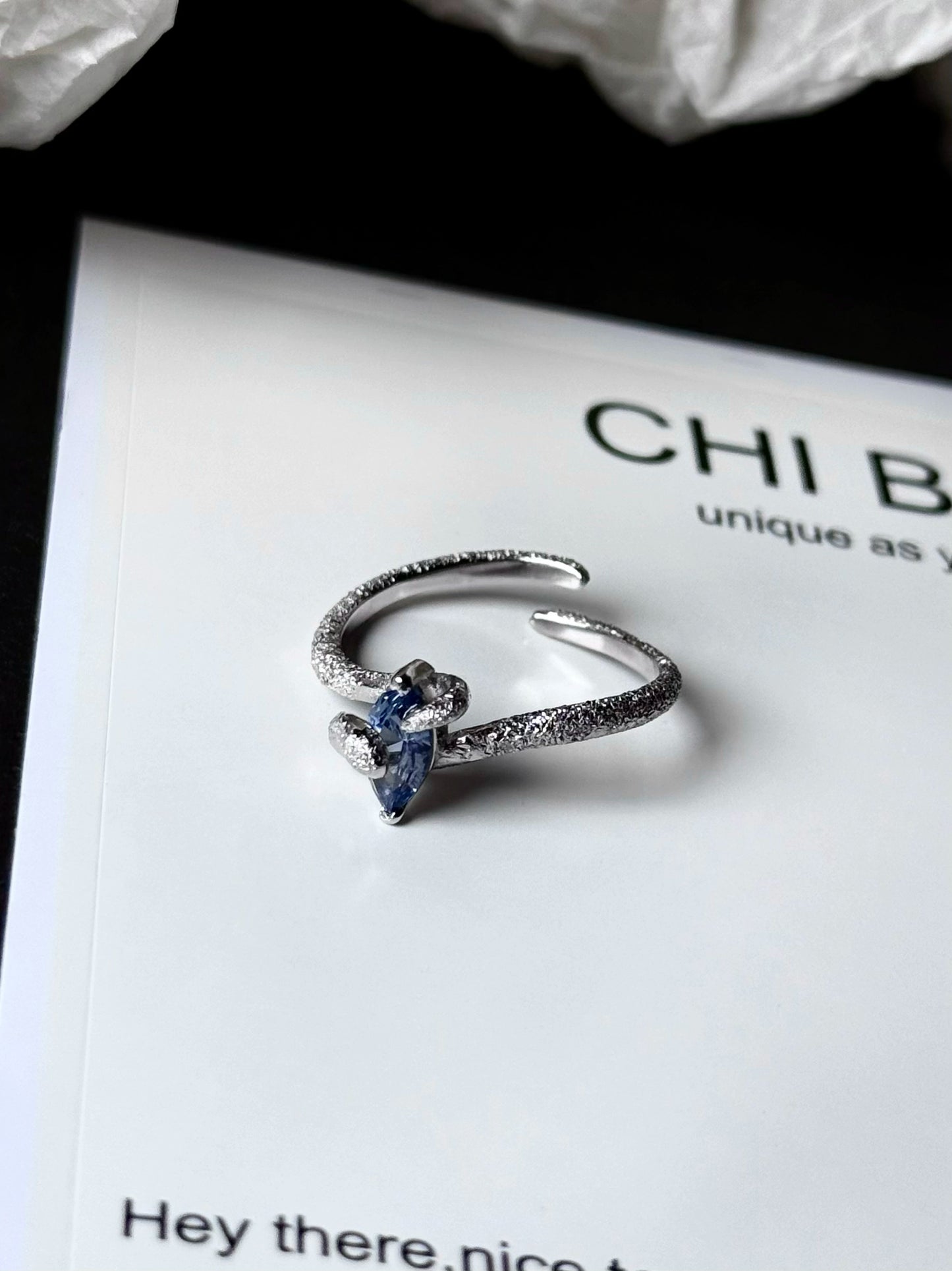 "Snow Snake" Blue Zircon Ring