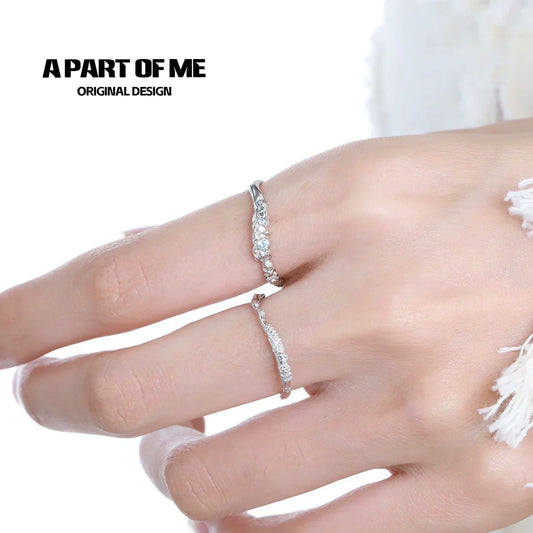 A PART OF ME minimalist lunar texture ring showcased on a hand with a delicate jewelry design