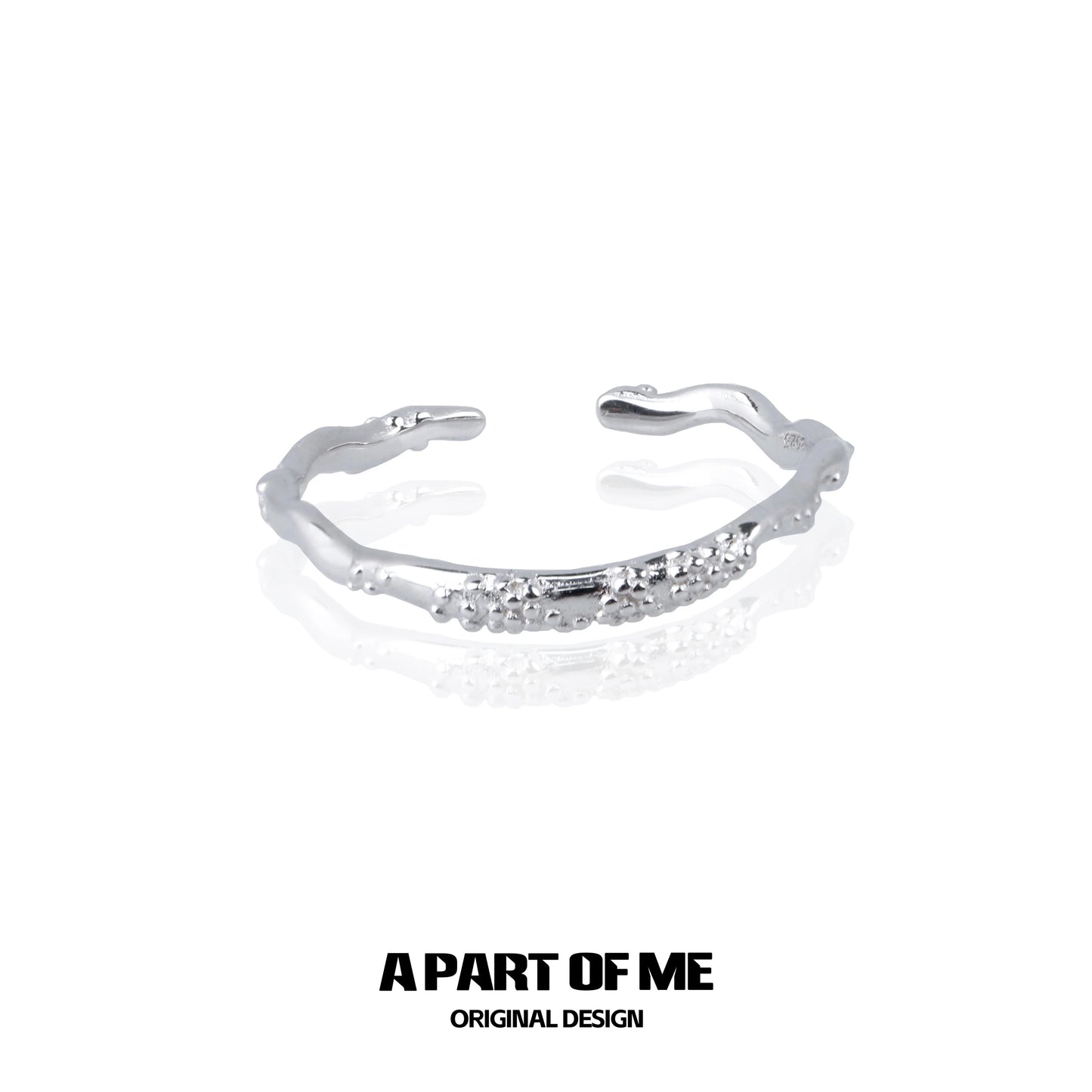 A PART OF ME minimalist lunar texture ring in silver with a unique, organic design for elegant wear