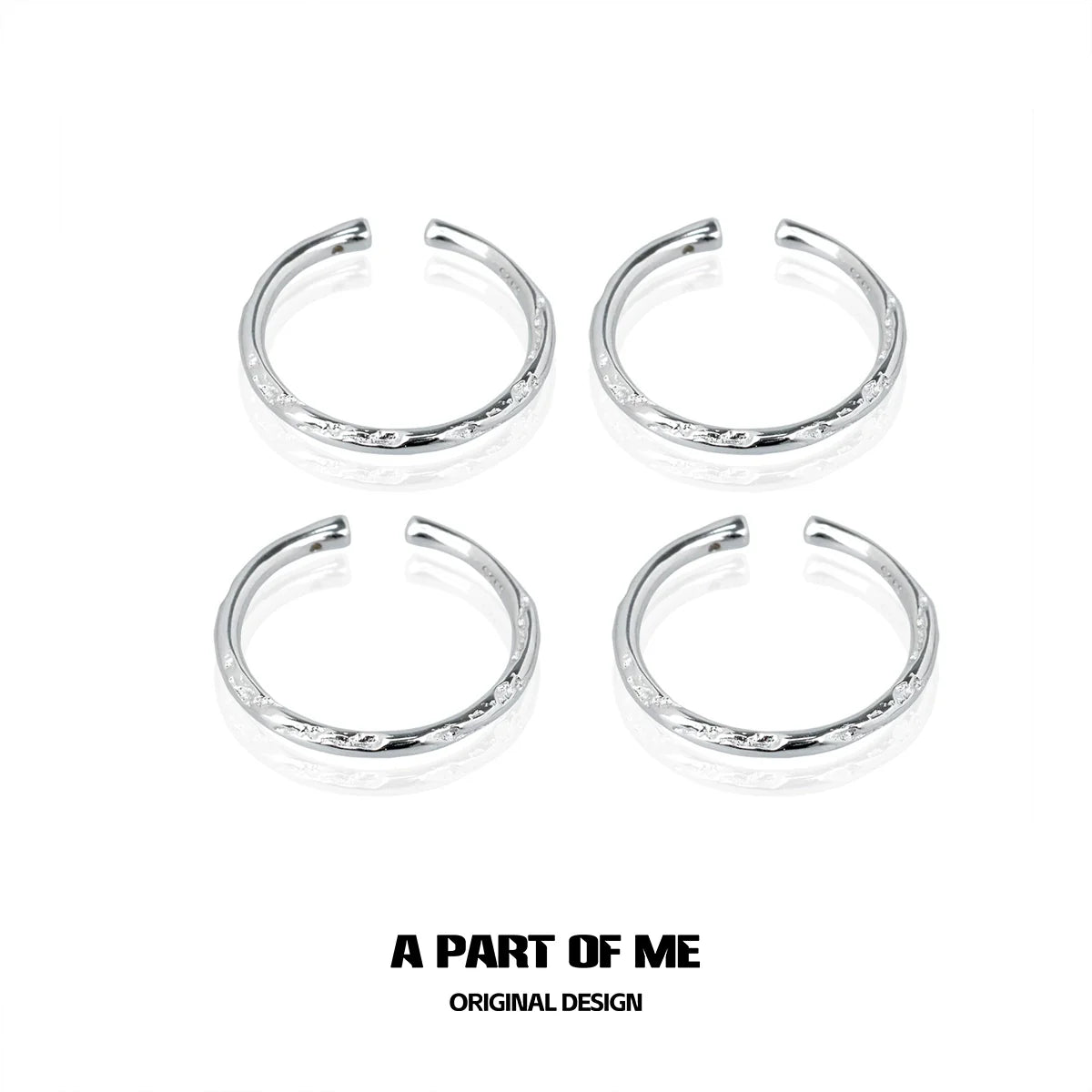 Set of four A PART OF ME minimalist stack rings in silver with delicate details