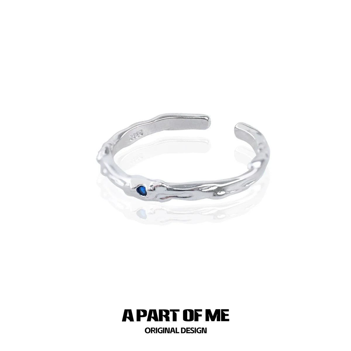 A PART OF ME ultra-fine zircon pair rings featuring a sleek design with a blue accent stone