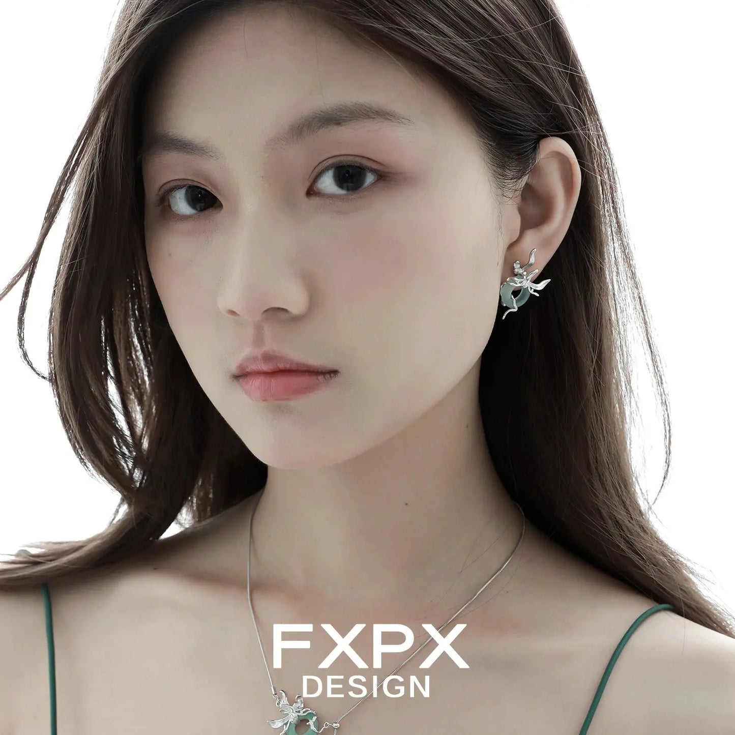Model wearing unique jade earrings for women with floral design by FXPX
