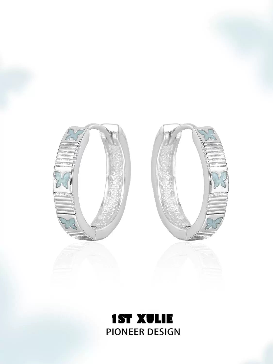 Elegant silver hoop earrings featuring blue butterfly earrings design for a stylish look