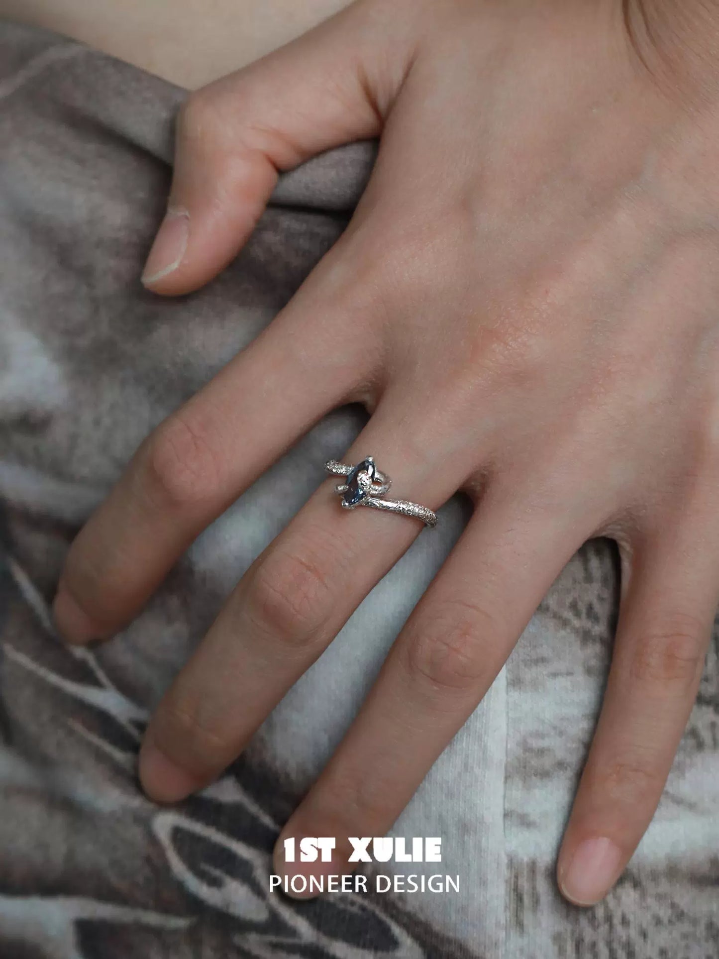 1ST XULIE Blue Ice Snake Silver Ring with Intricate Design on Elegant Hand
