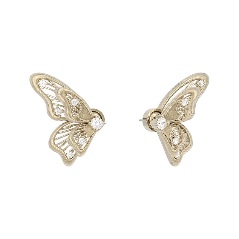 SUN HUNTER butterfly wing earrings with intricate design and sparkling accents