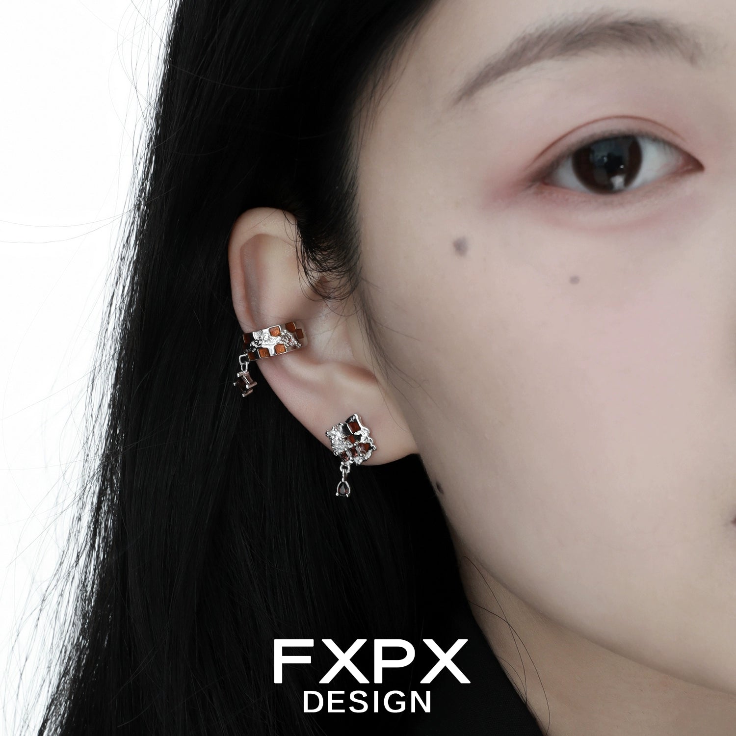 Bloody doll gothic brown checkerboard ear cuff worn on upper ear with matching earring from FXPX
