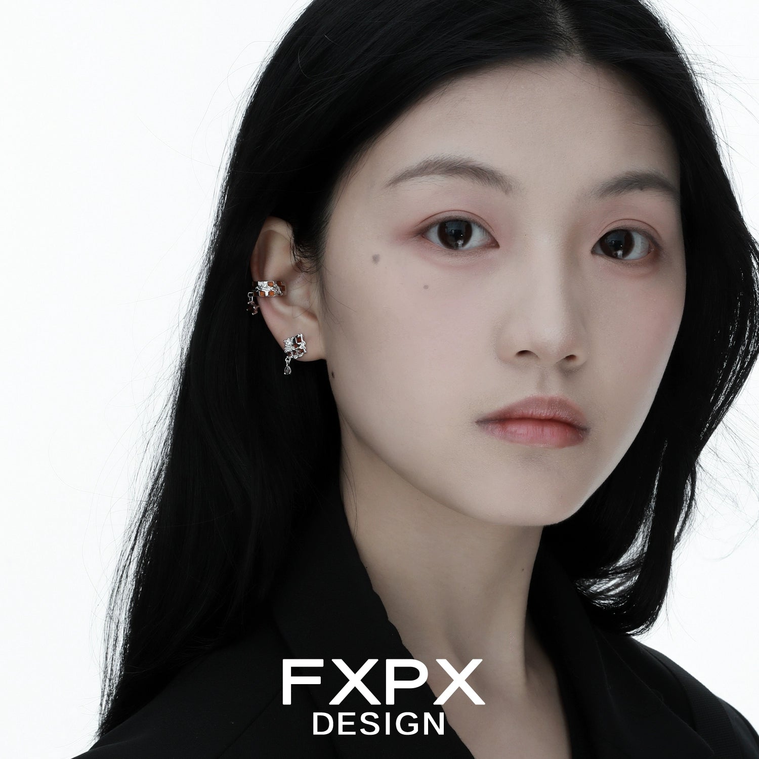 Model wearing bloody doll gothic brown checkerboard ear cuff by FXPX with black hair and black outfit