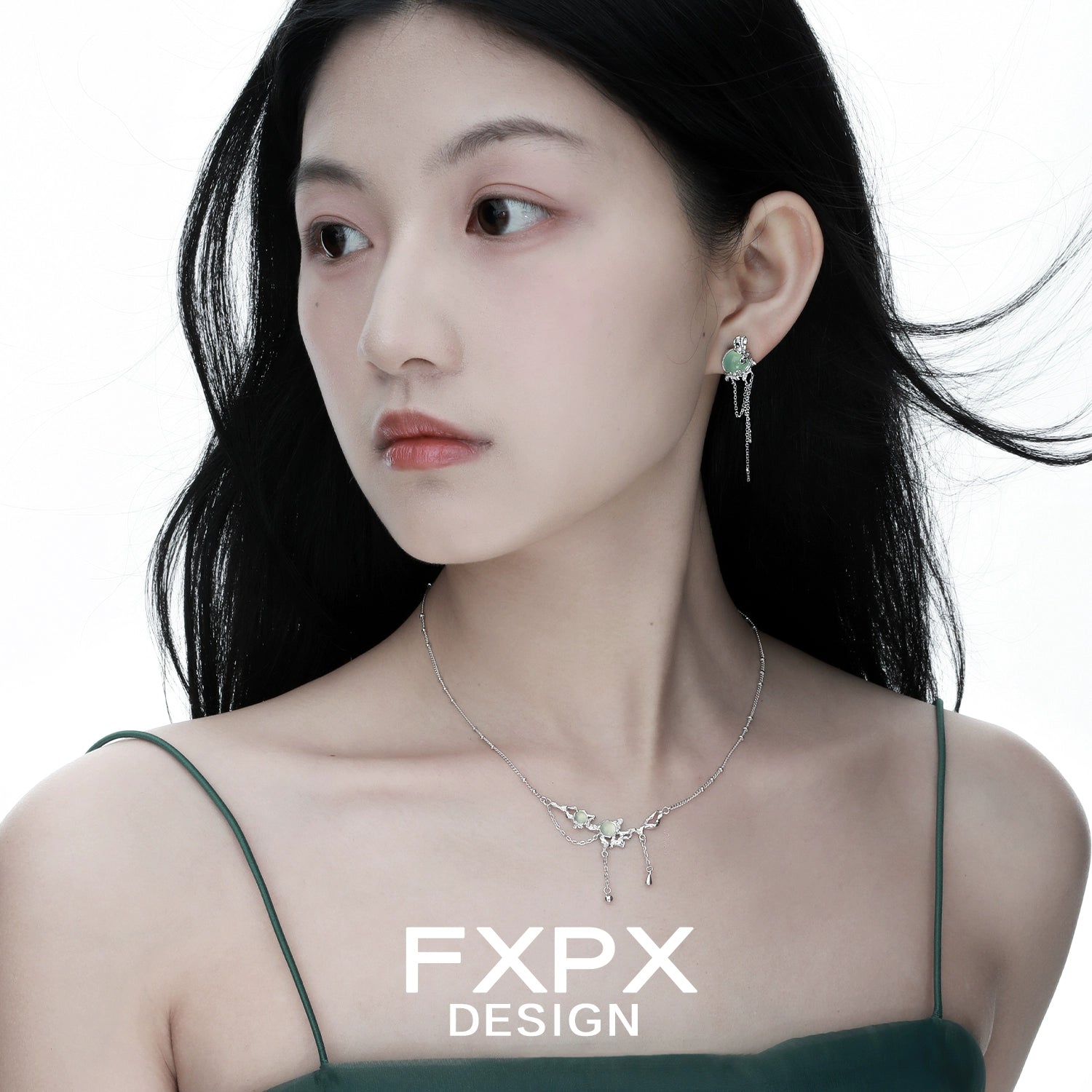 Model wearing Bloody Doll Jewelry gentle green agate tassel earrings and matching necklace by FXPX