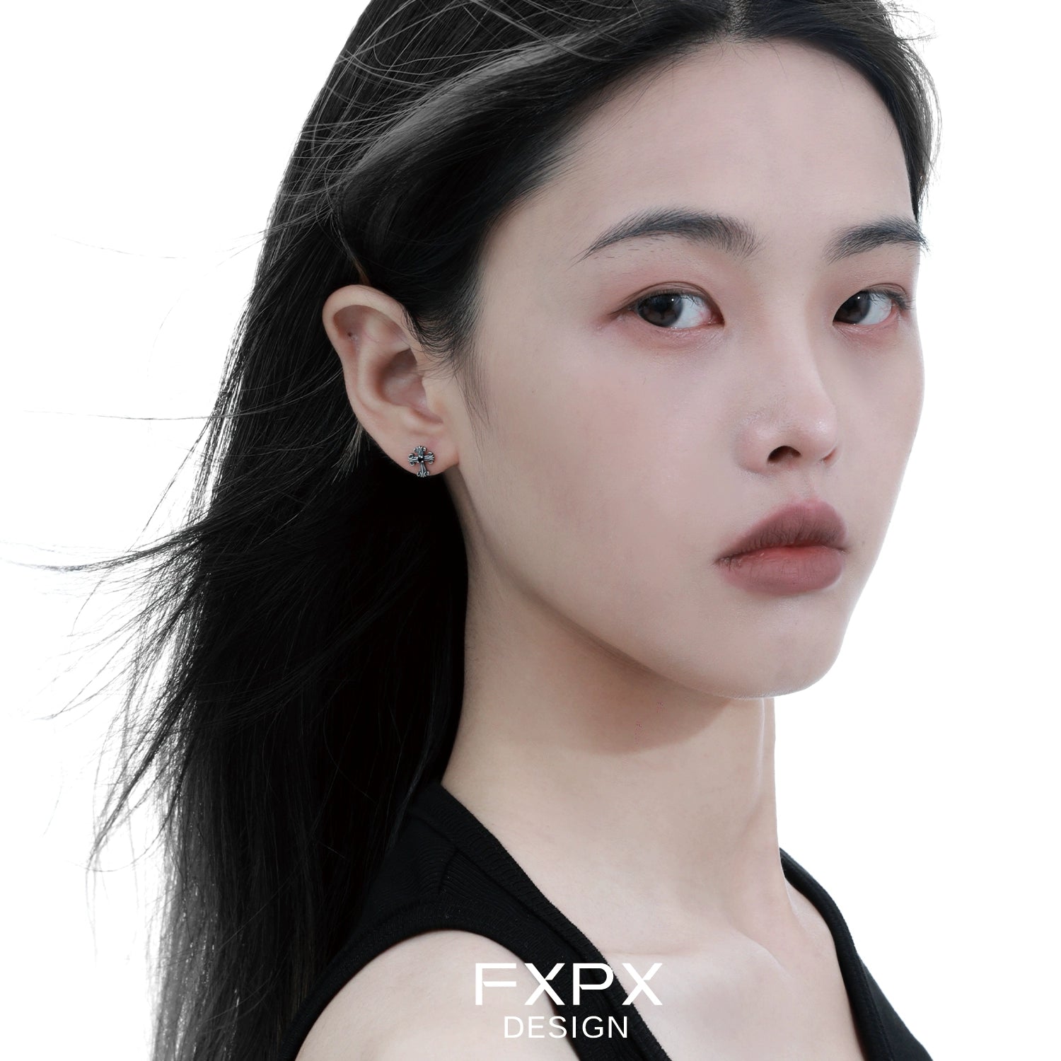 Model wearing bloody doll jewelry gothic cross stud earrings with black tank top by FXPX