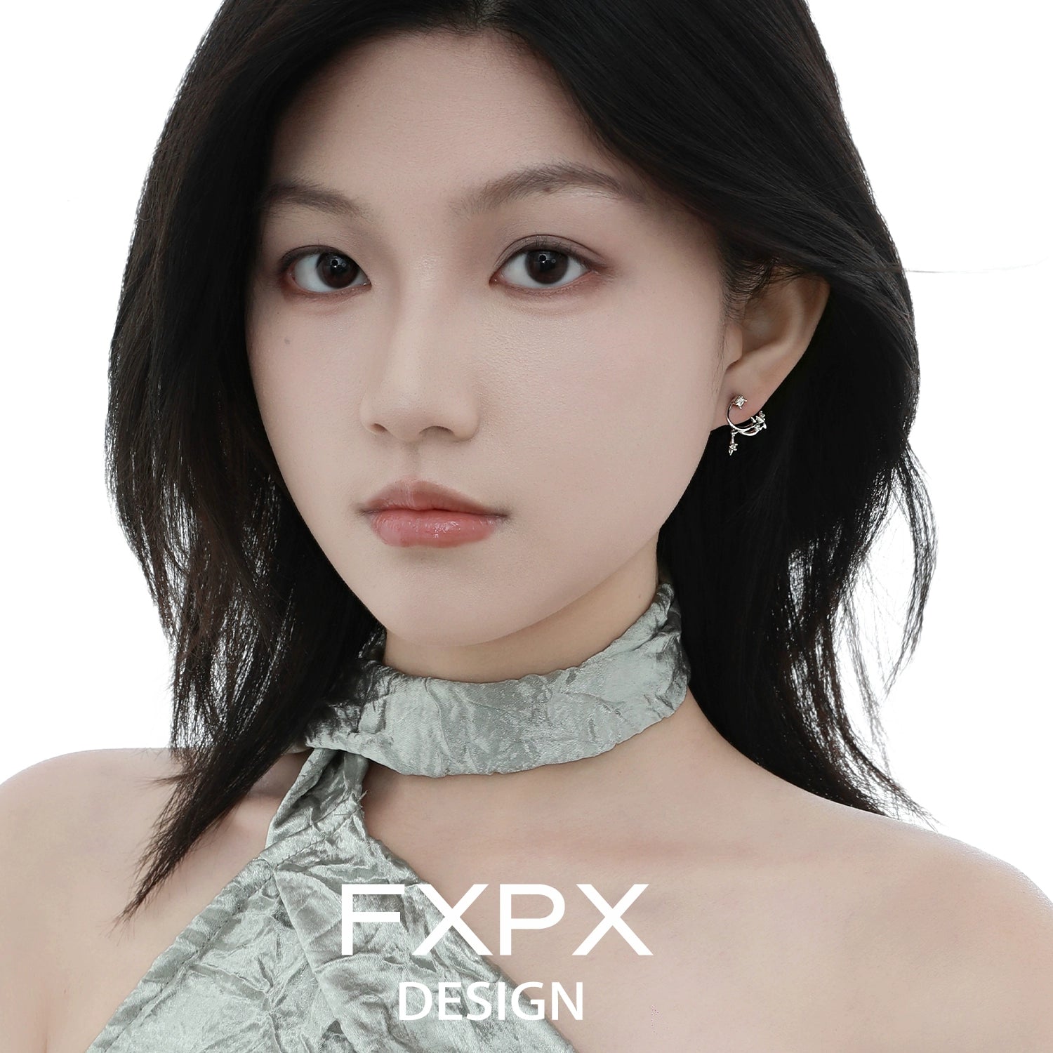 Woman wearing bloody doll jewelry silver star constellation stud earrings with delicate design