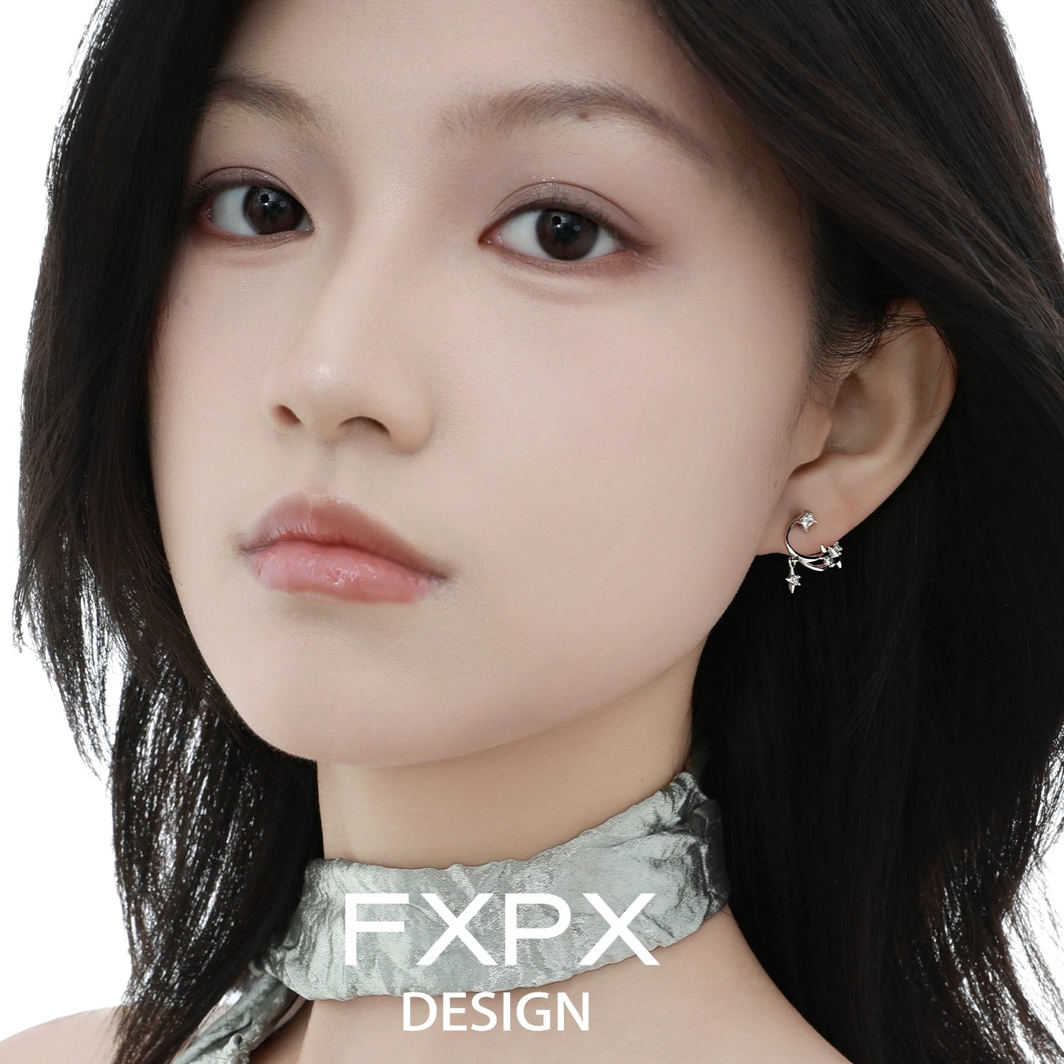 Woman wearing bloody doll jewelry silver star constellation stud earrings showcasing delicate silver celestial design