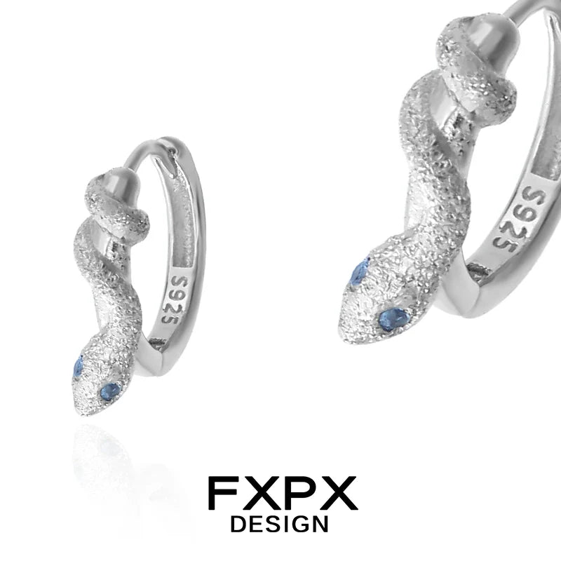 Glacier blue snake earrings with detailed design and sparkling accents for a unique look
