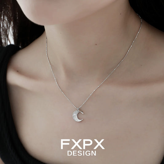 FXPX Shattered Moonlight Zircon Necklace with delicate crescent moon pendant on a silver chain