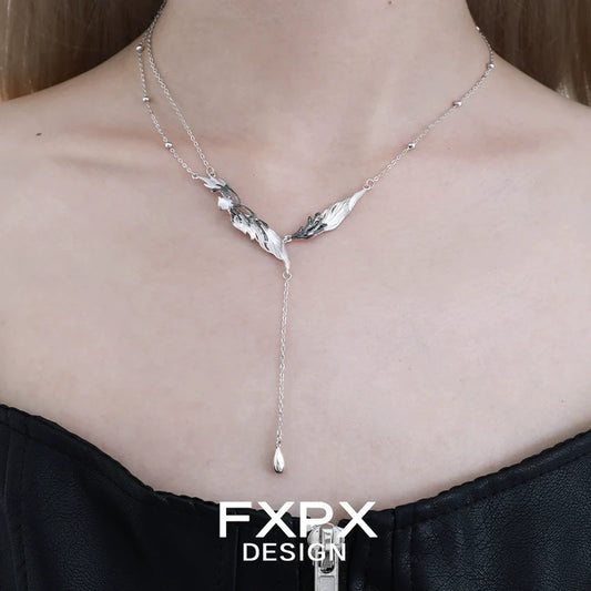 Y2K black feather necklace featuring a layered design with silver accents for a trendy look