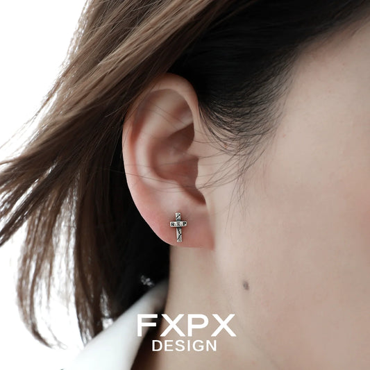 FXPX Y2K punk cross earrings showcased on an ear for a trendy look
