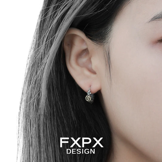 Y2K rose vintage earrings dangling elegantly on a model's ear showcasing their unique design