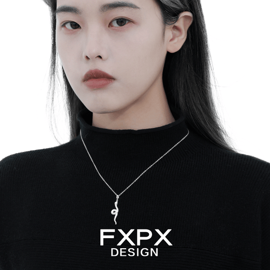 Model wearing Y2K silver snake necklace, showcasing its sleek design and modern aesthetic.