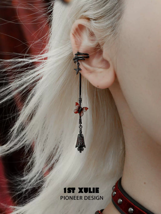 Gothic butterfly earrings with intricate design, perfect for adding a unique touch to any outfit