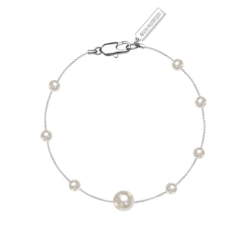 SUN HUNTER gypsy star pearl bracelet featuring delicate pearls on a silver chain