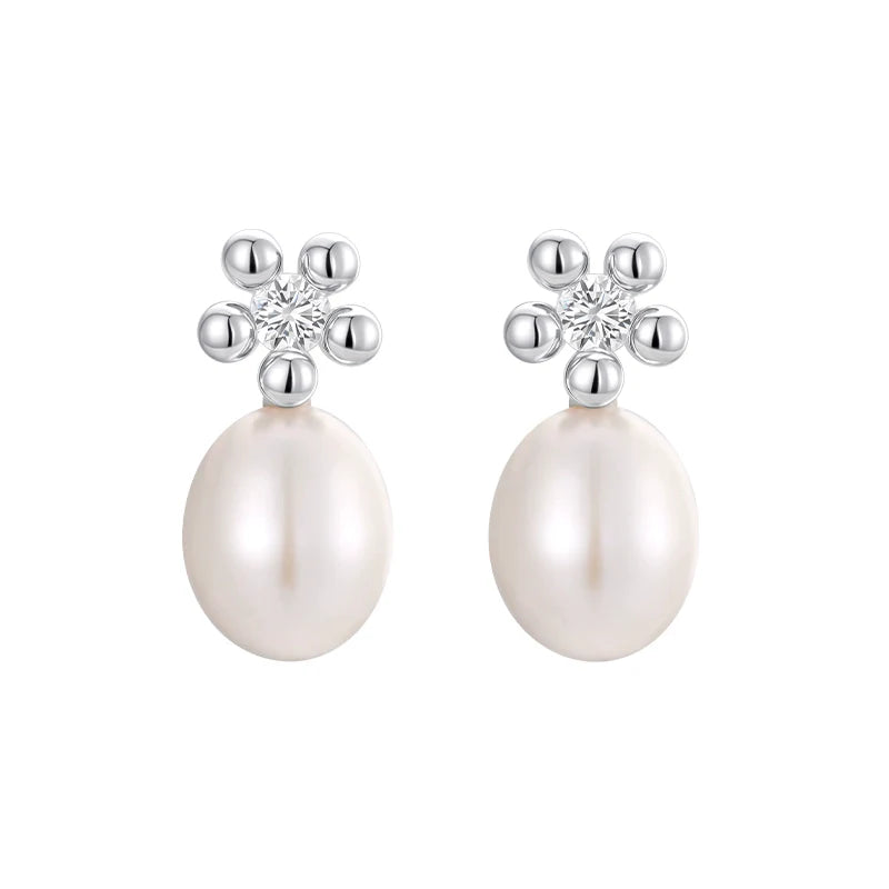 Elegant island flower pearl earrings with silver accents and sparkling details for a stylish look
