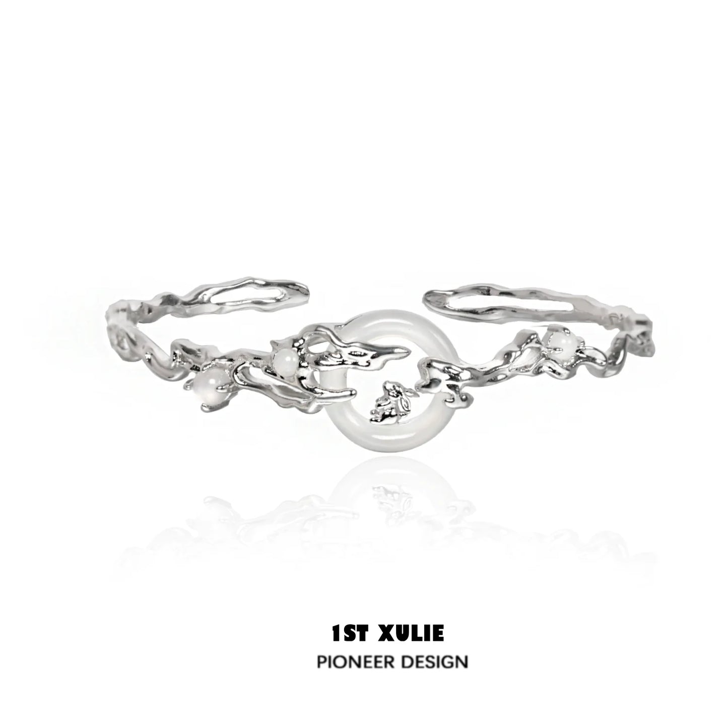 Elegant jade rabbit white agate silver bracelet featuring intricate design and polished finish
