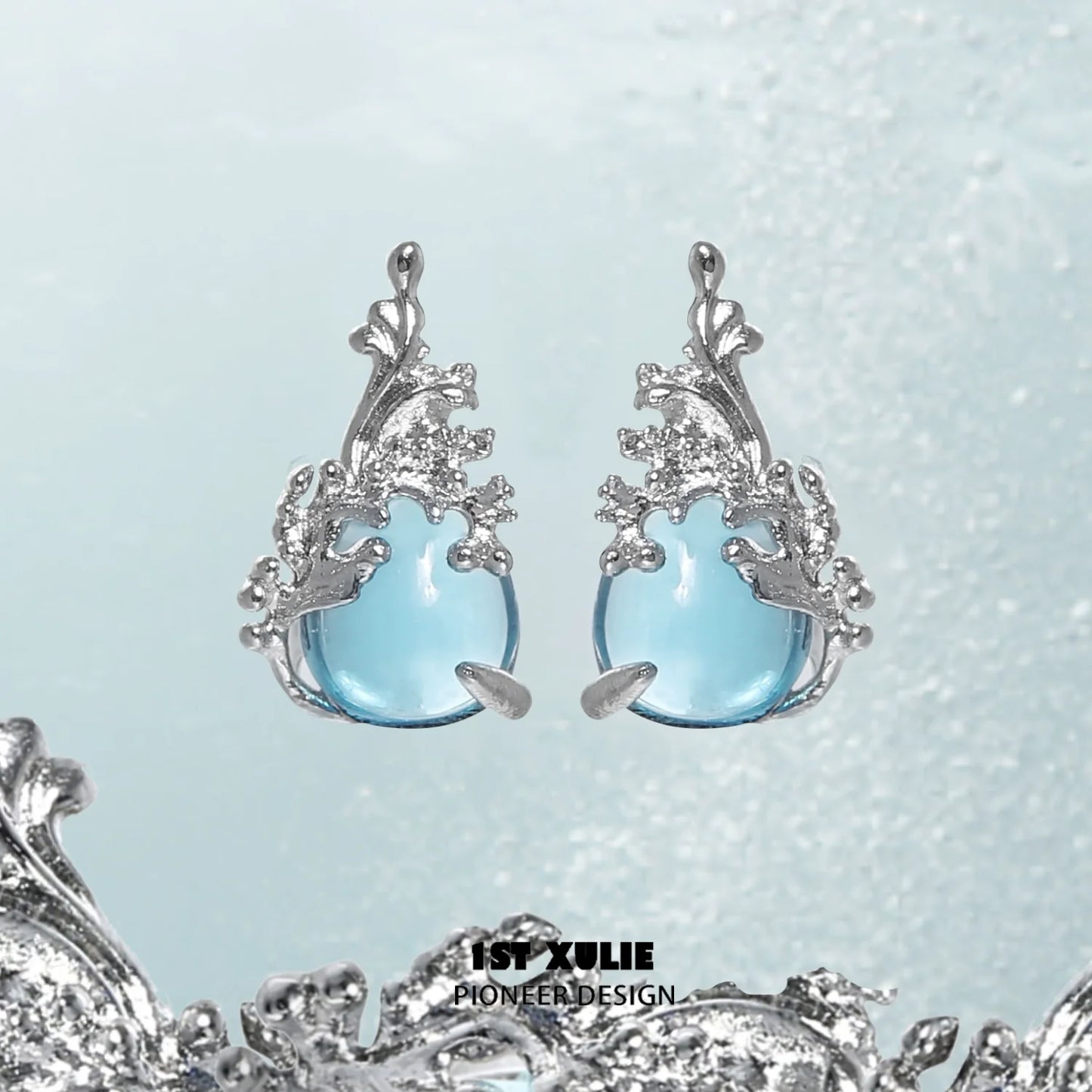 1STXULIE Silver Mermaid Tear Earrings with Blue Gemstone and Intricate Design