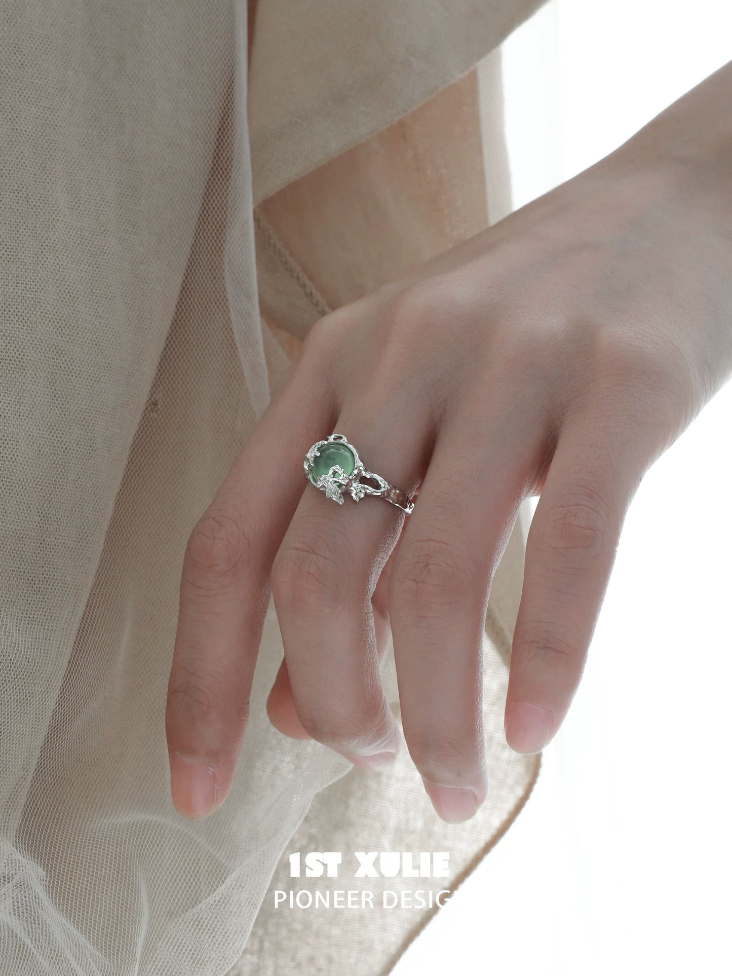 1ST XULIE mystical forest fairy silver ring with a delicate design featuring a green gemstone