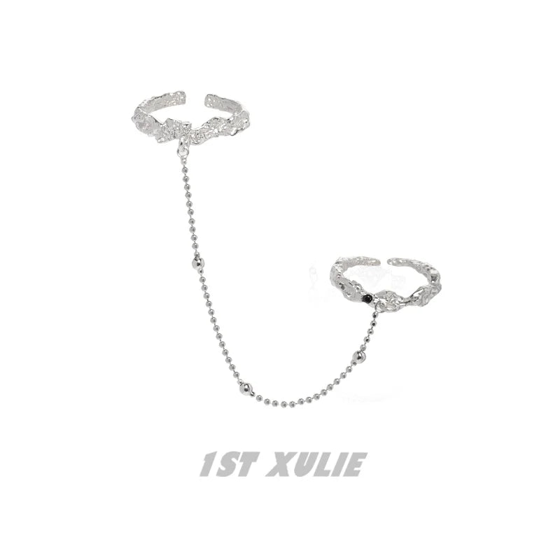 Y2K controller chain silver ring featuring intricate design and link chain connection