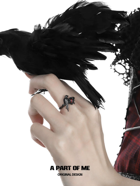 A Part of Me raven heart ring featuring a unique design with a raven and red heart detail