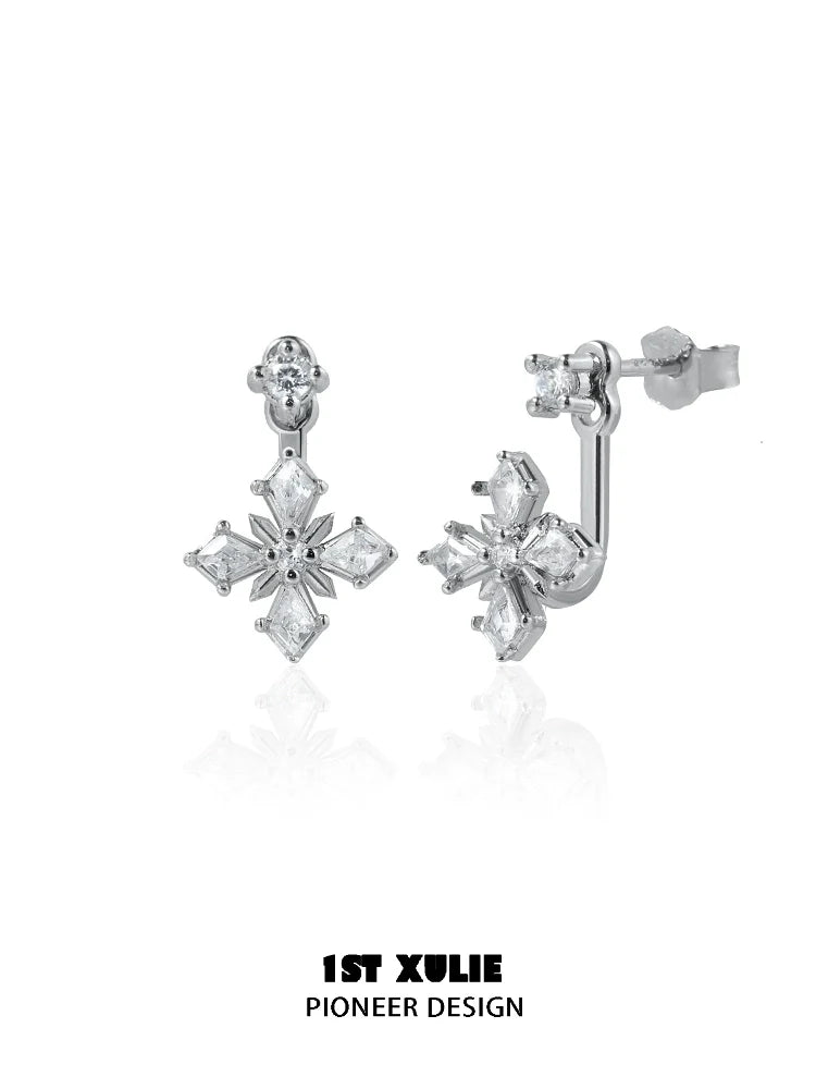 Elegant silver star earrings with sparkling gemstones in a chic design for stylish outfits