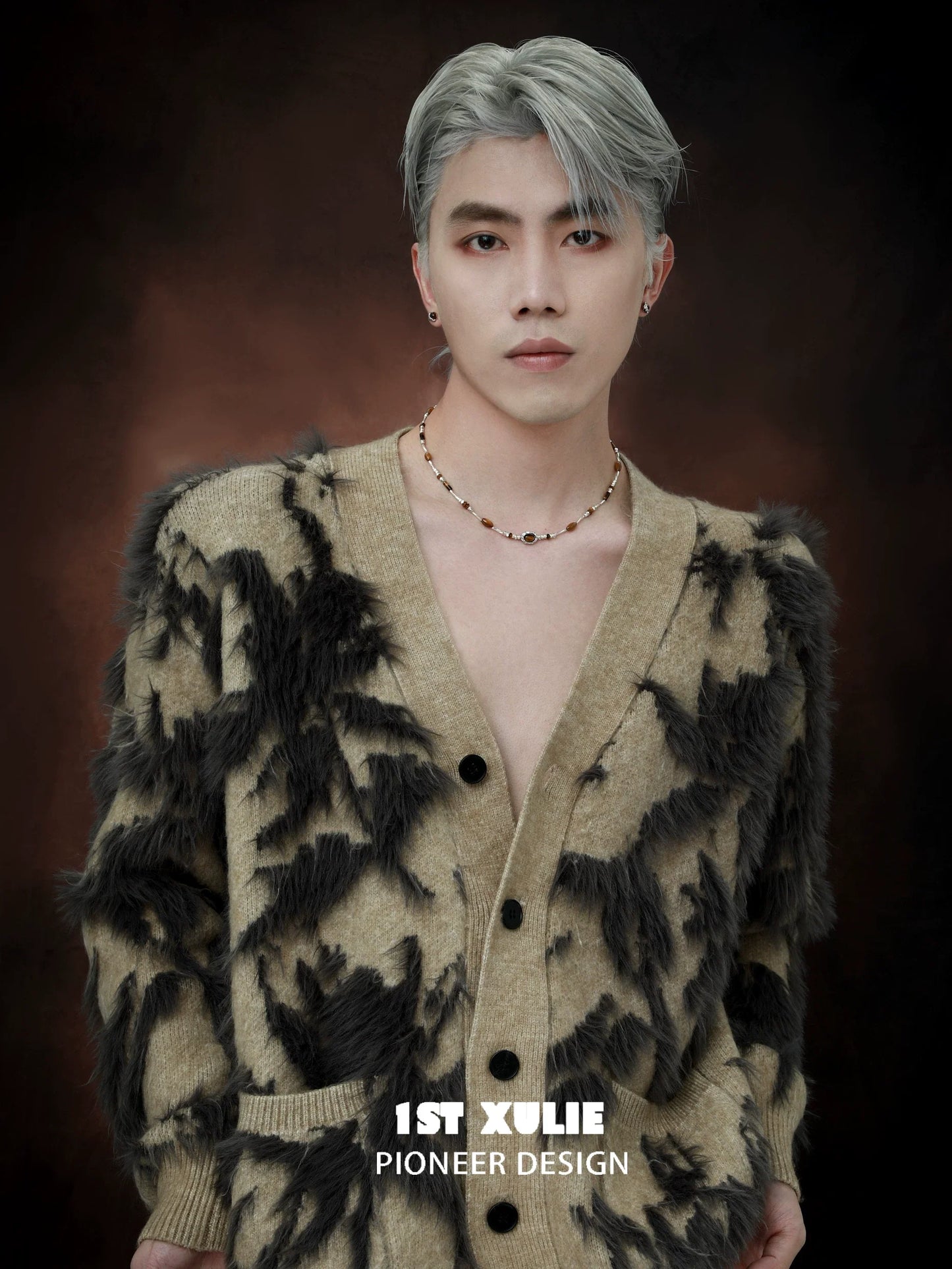 Stylish model wearing a tiger's eye necklace for women, paired with a trendy cardigan