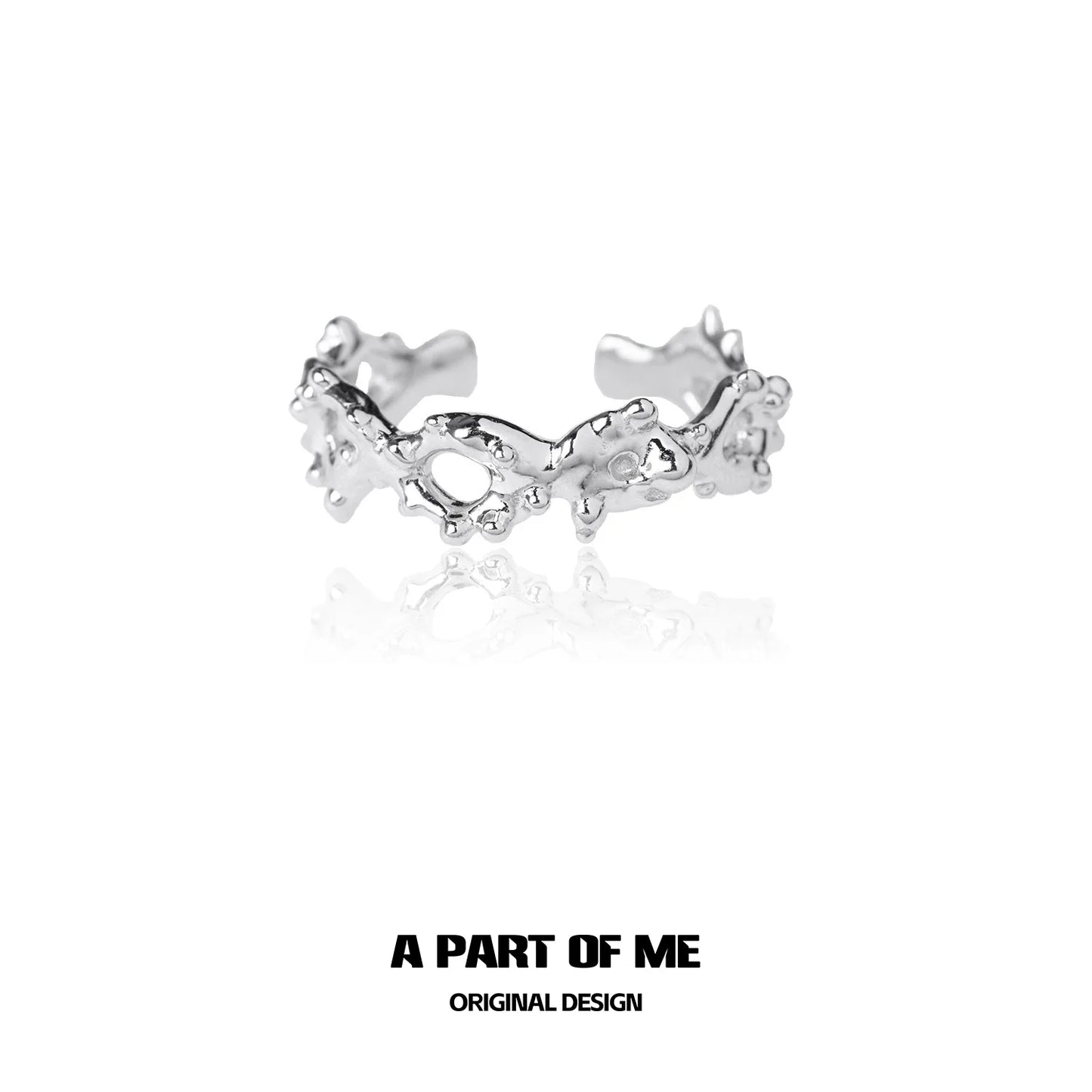 Unique silver ring by A PART OF ME featuring an artistic design with textured details