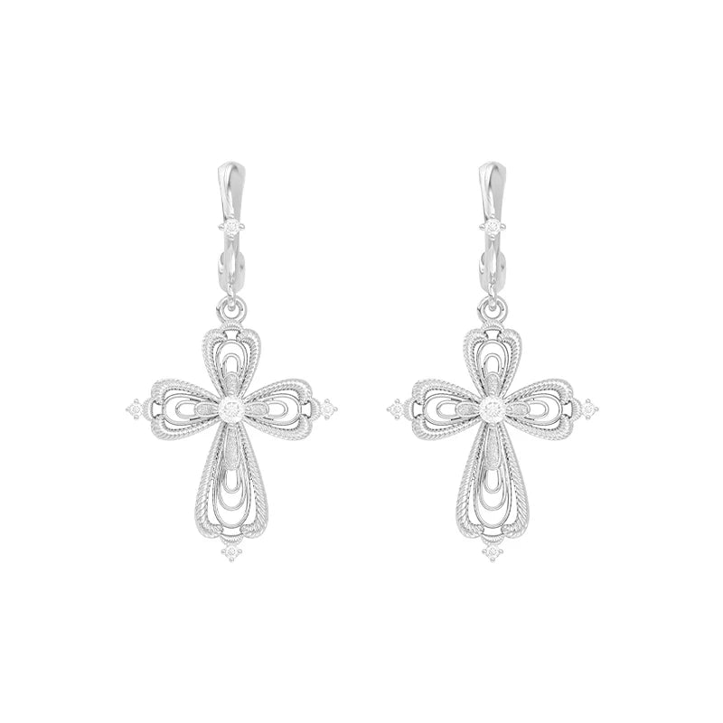 Elegant vintage cross earrings by SUN HUNTER with intricate design and sparkling accents
