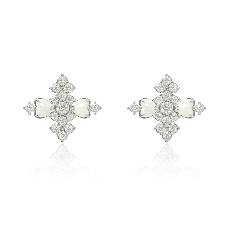 Elegant vintage cross earrings with sparkling gemstones and a symmetrical design for stylish accessorizing