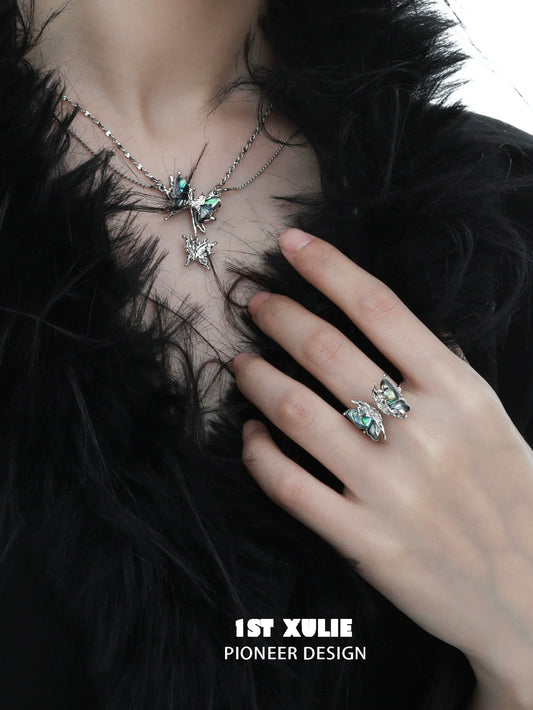 Y2K butterfly silver ring design showcased with matching jewelry for trendy style