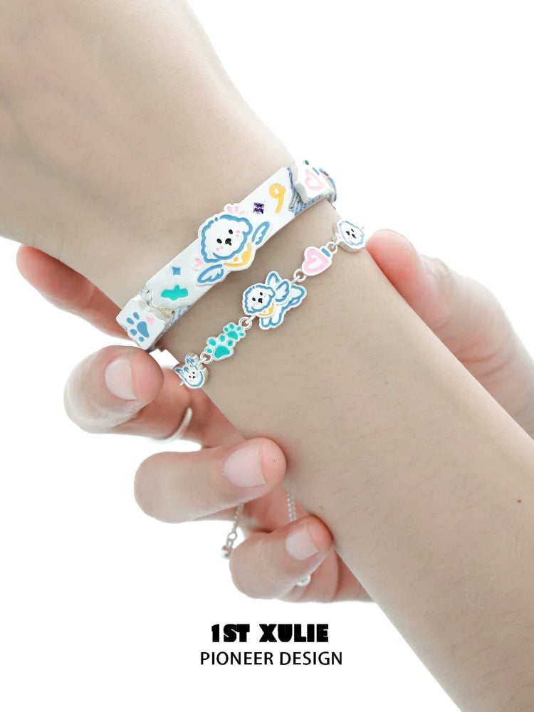 Colorful angel cat and puppy bracelet featuring playful animal designs for a charming accessory