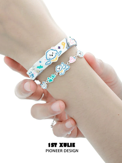 Colorful angel cat and puppy bracelet featuring playful animal designs for a charming accessory