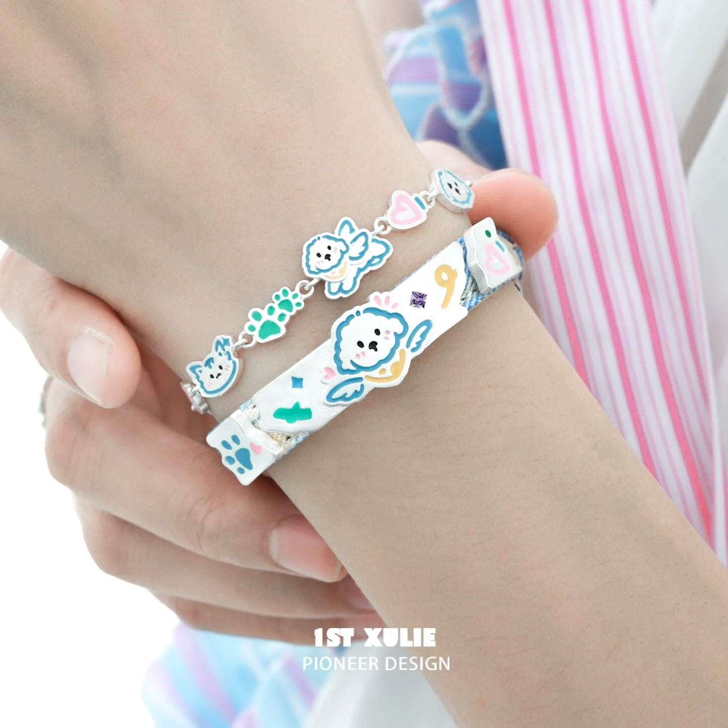 Colorful angel cat and puppy bracelet stack featuring cute animal designs for playful accessorizing