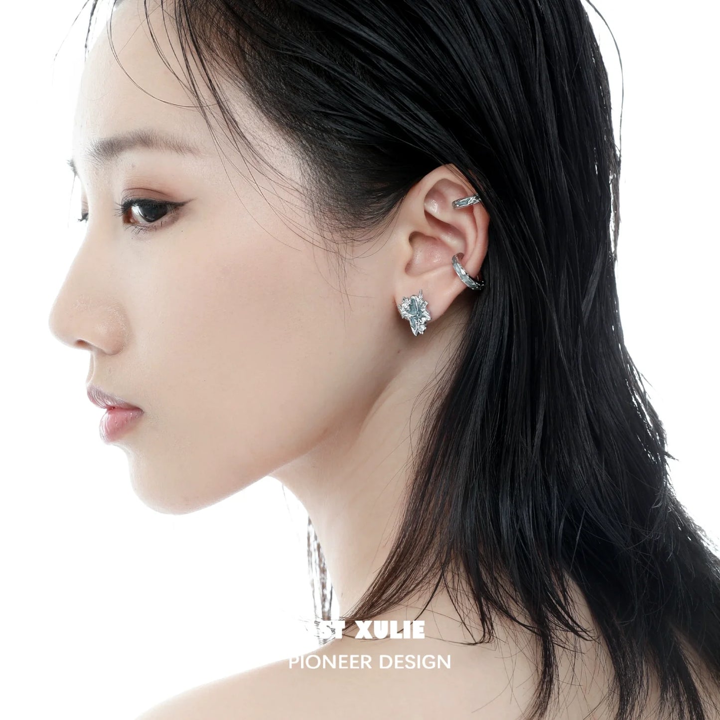 Fashion model wearing 1STXULIE Arctic Sea Breeze Earrings for a stylish look
