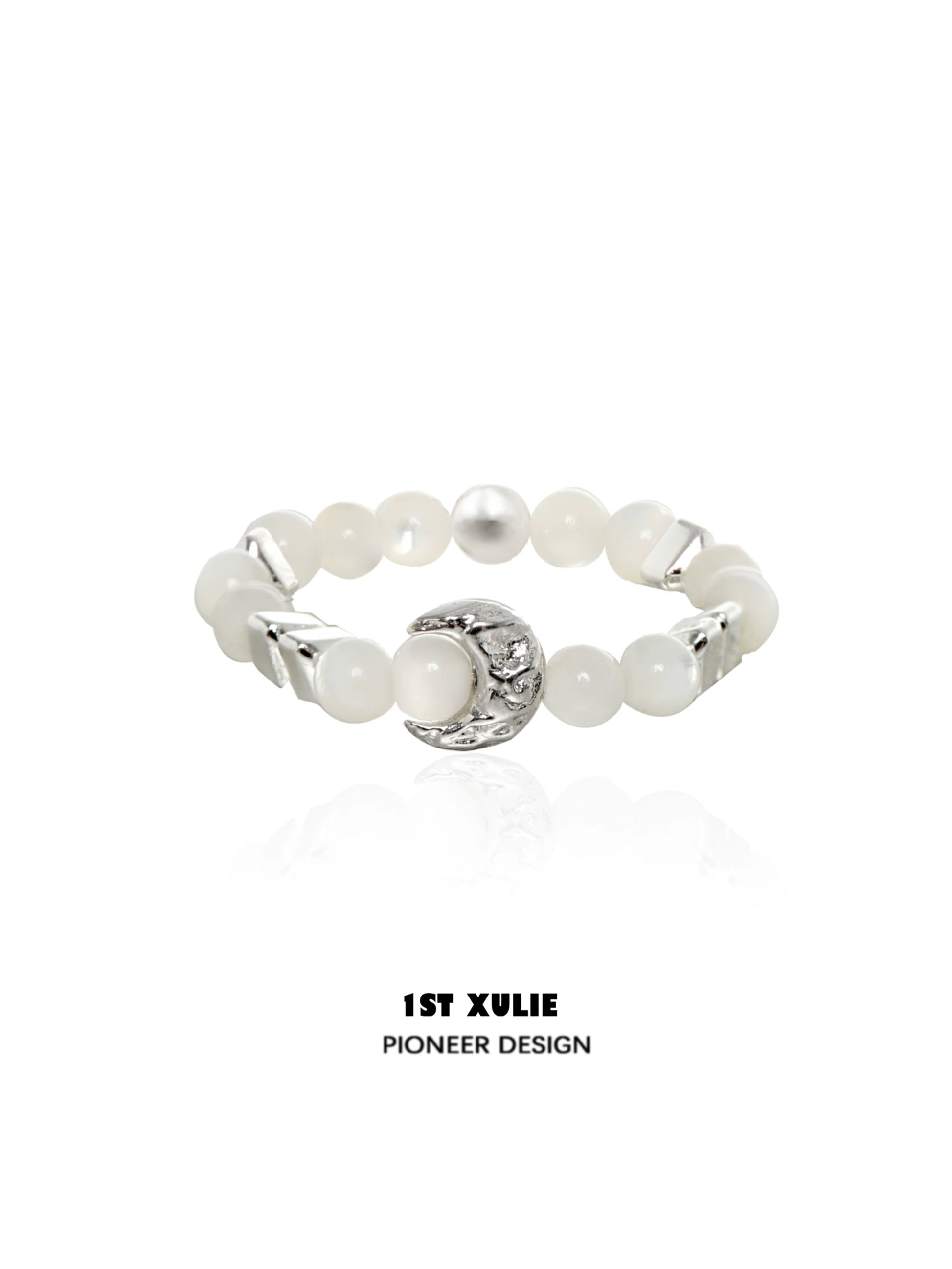 Beaded shell pearl silver ring from 1STXULIE featuring elegant design and unique texture.