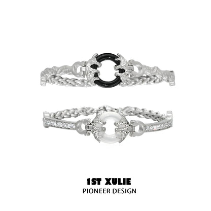 Stylish black and white couple bracelet featuring silver chains and a unique design
